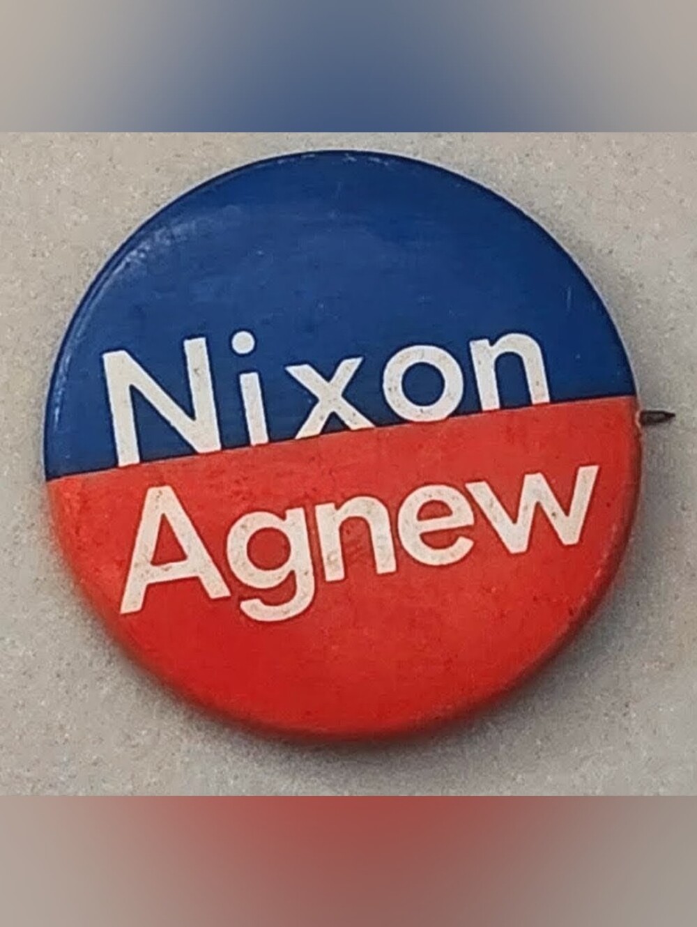 Vintage Nixon Agnew campaign button in blue and red